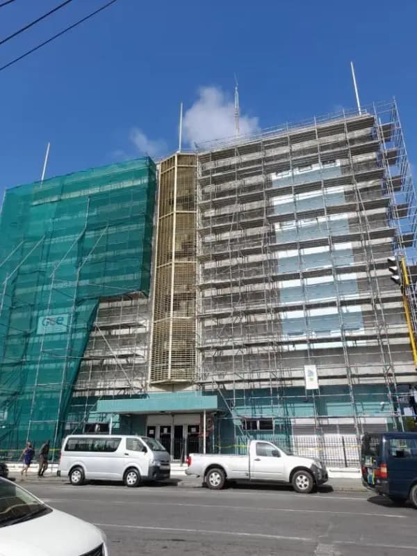 Street view of the scaffolded building